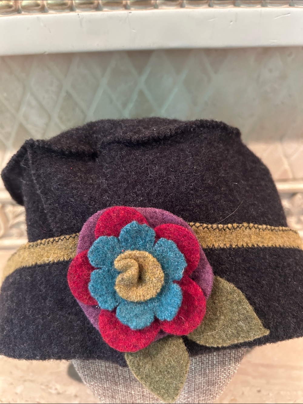 Woolflower Women’s Black Wool Cloche Hat with Multicolor Felt Flower